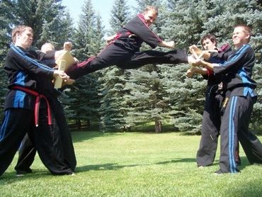 Lightning ITF Taekwondo mentor Mr. Chris Howes breaking boards