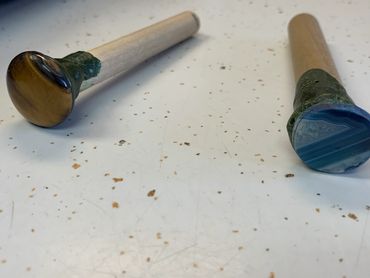 Cabochons in progress on dopsticks