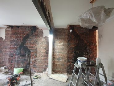 Chimneys removed and structural beam installed