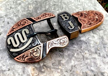 Bluegrass Engraving custom 3-piece ranger buckle set with copper, handcrafted and hand engraved.