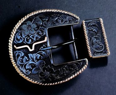 The Law Man, by Bluegrass Engraving,  buckle set with copper border, engraved by Brian Ferrand.
