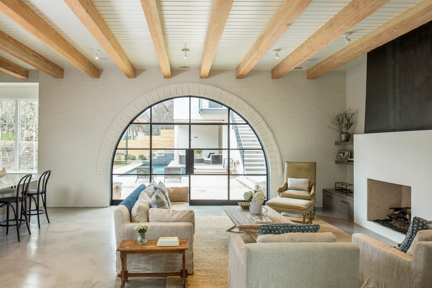 2017 Max Award Custom Home-Austin, Texas.  Great Room featuring custom steel & glass arched doors
