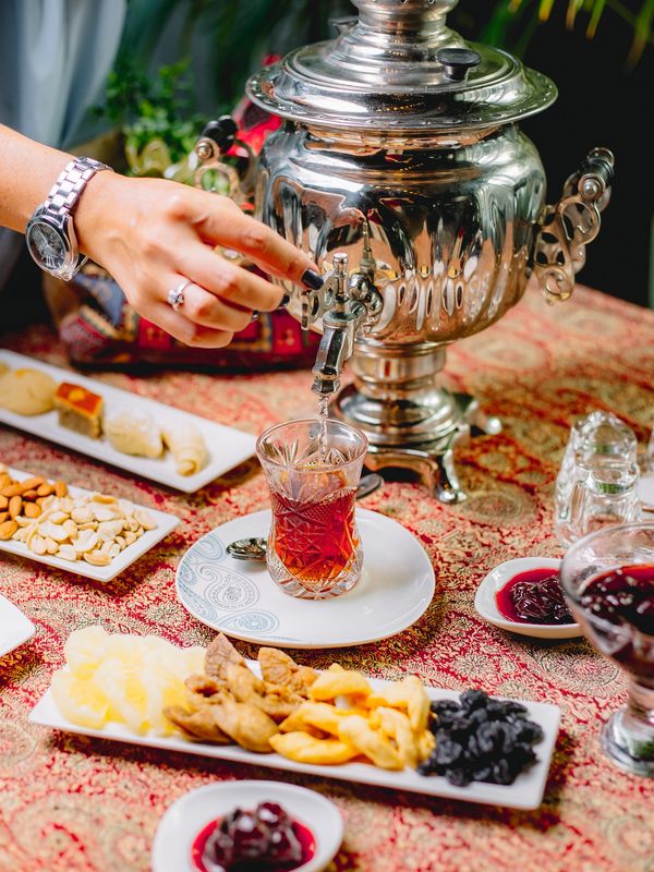 a samovar pouring Persian Blends Black Tea into a glass