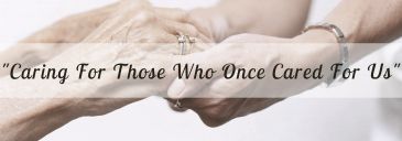 Hands holding with care and compassion.