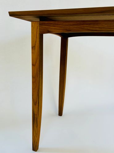 Close-up of a wooden table leg.
