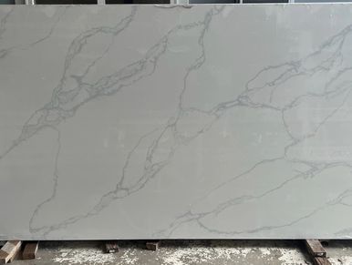 Large slab of white marble with subtle gray veins.