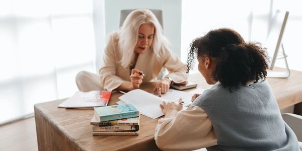 Therapist giving an evaluation test to a patient