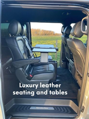 Luxury leather seating with additional multi purpose tables. Ideal for laptops, charging points.