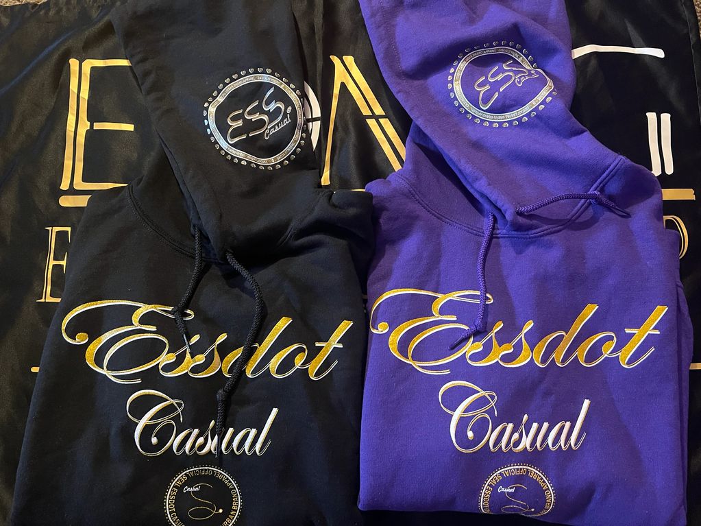 LADIES STACKED LOGO HOODIE WITH LADIES LOGO ON THE BACK AND SIDE HOOD IN BLACK AND PURPLE. MENS/UNIS