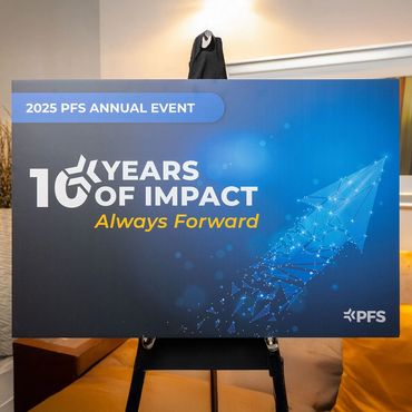 Poster for event on easel.