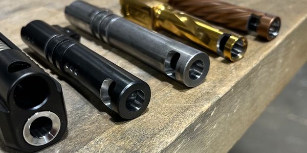 Glock and Staccato pistol barrels that have been crowned and ported.