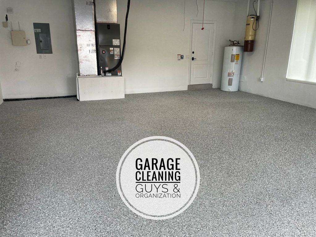 A two car garage with epoxy Polyaspartic Flooring