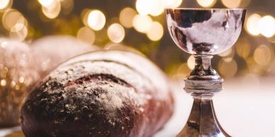 Traditional bread and chalice used in religious ceremonies.