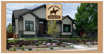 Modern house with landscaping and Cowboy Country Contractors logo.