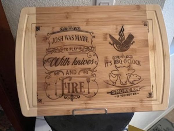 Custom cutting board 12 x 17 with "Josh". Board standard is I was made to play with knives.