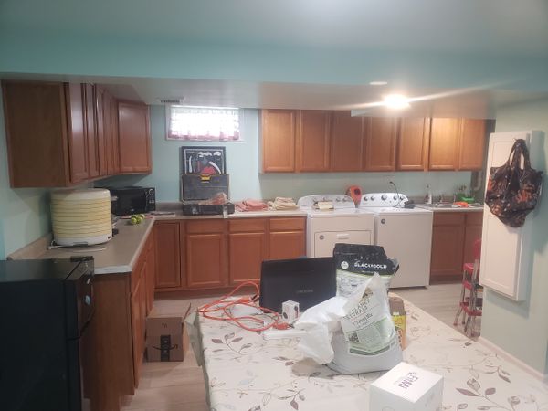 Basement Renovation Progress Picture, Cabinet Installation, Countertop Installation, Wall Addition