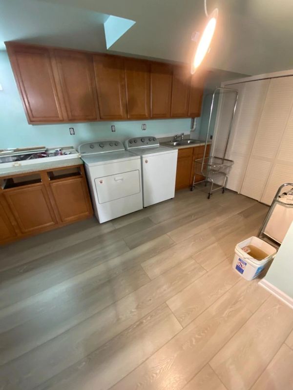 Basement Remodel After Picture, New Doors, Cabinets, Flooring, Paint, Baseboards