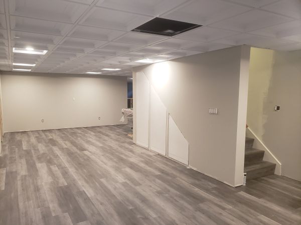 Basement Remodel Progress Picture, Drop Ceiling, Under stair Storage, Paint, Electric...everything.