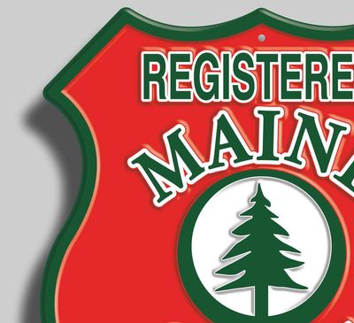 Shield-shaped emblem with 'Registered Maine Guide' and a pine tree graphic.