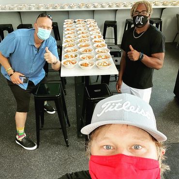 Ryan Dwyer, Dion Crowder and Brian Clevenger feed Childrens Hospital.