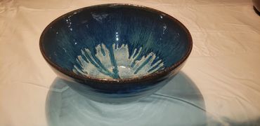 Ceramic bowl in Textured Turquoise with Ancient Jasper.   Approximate dimensions:  12" wide by 8" ta