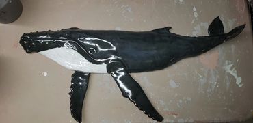 Humpback Whale wall hanging in clay.  Approximate dimensions:  27" wide by 14" tall.