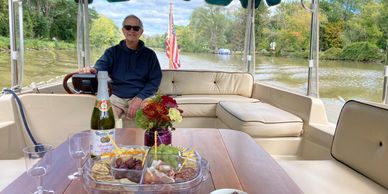 The Captain. Captain JJ has a 100 Ton USCG license, with 13 years experience as a tour boat captain