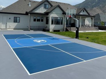 Backyard Court. Grey Sport Court. Blue Pickleball Court. Sports Surfacing. Painted Court. Acrylic