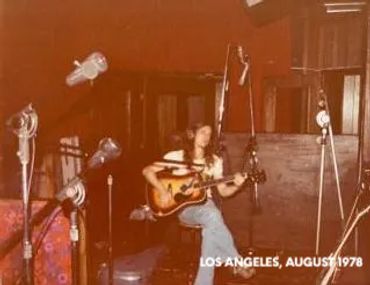 Vintage photo of guitarist in recording studio