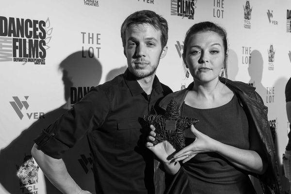 Katherine LaVictoire and director Keith Schneider with their Audience Award for Stellar Hosts