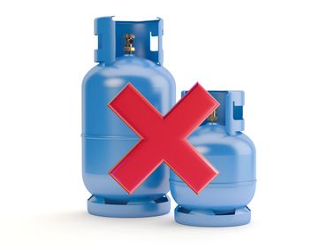 Two blue gas cylinders with a red cross indicating prohibition.
