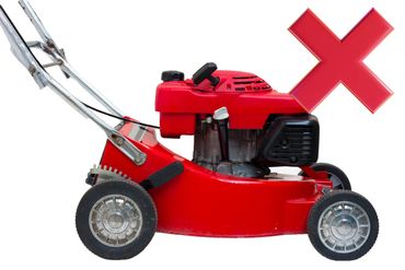 Red lawn mower with a large red X beside it.