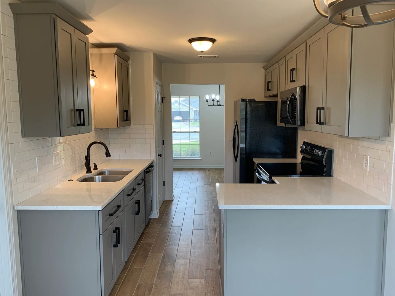 Small be efficient kitchen rebuild after a floor on the second story of the home. Navarre. Florida.
