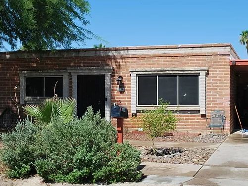 East side burnt adobe beauty. This amazing 5 bedroom home with a large lot next to golf course!