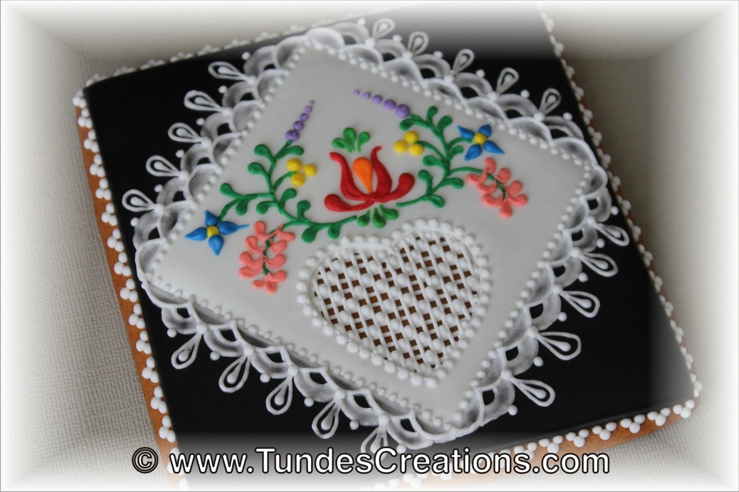 Honey gingerbread cookie with Hungarian folk art flowers.