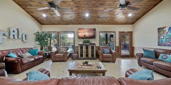 Image of Rustic Riviera Lodge living room in Concan, TX near the Frio River.