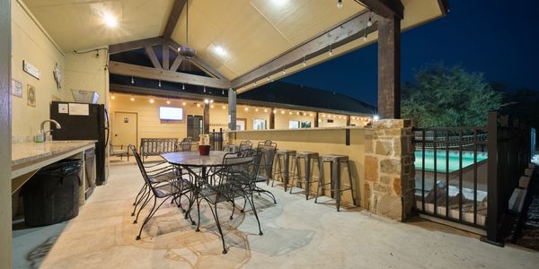 Night picture of Rustic Riviera Lodge Cabana in Concan, TX near the Frio River.
