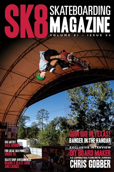 Skateboarder performs a high aerial trick under a hangar roof.