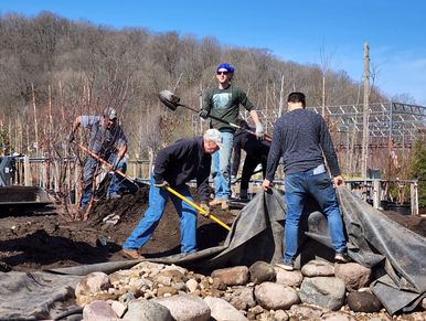 Crew hard at work building a large pond