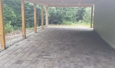 Covered patio with pavers in Northern New Hampshire