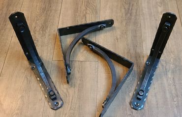 8 Inch by 1-1/2 Wide Shelf Bracket, Textured with riveted brace. Finish is Waxed or Oiled
$65. each