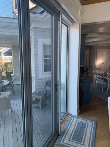 Phantom XL Wall Screen w/ recessed track blends beautifully into this Masons Island Waterfront Home