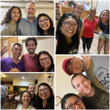 A cheerful woman with red glasses takes selfies with different groups of smiling people indoors.