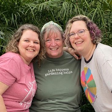 Three ladies smiling