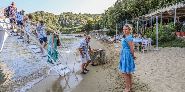 Organise your perfect day with a beach wedding and sunset cruise. 