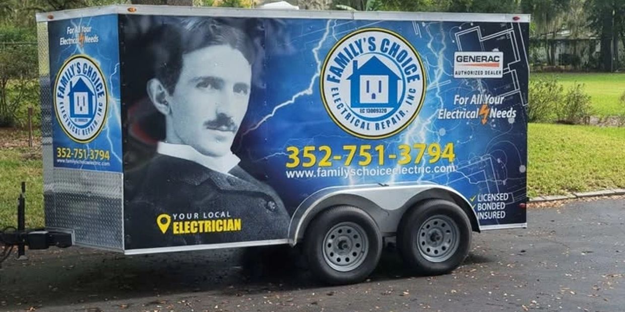 Electrician trailer featuring Nikola Tesla's image and contact details for Family's Choice Electrical Repair.