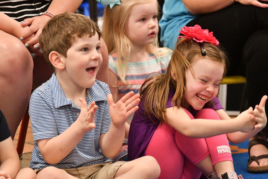 Kids laughing at Booneville magician Bentley Burns