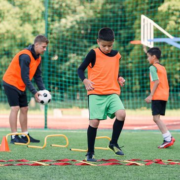 Young boys playing football