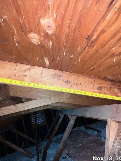 Fortified Evaluator documenting attic space