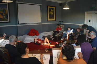 Burlesque performer Ruby St James poses for Love2Sketch art class.